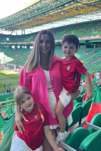 Debora Lourenco with her children to cheer for her husband Ruben Neves.